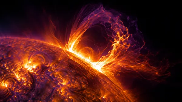 Solar flare illustration showing bright plasma arcing from the sun's surface into space